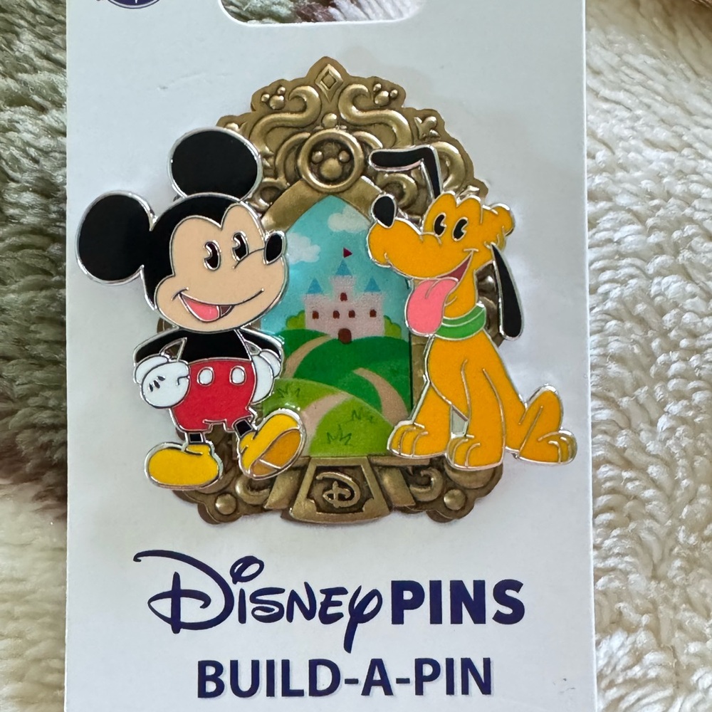 Disney Build-A-Pin with Mickey in Red and Pluto in Orange $25